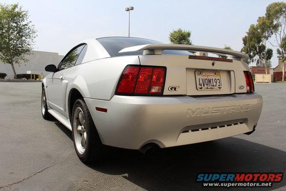 Silver 2002 Ford Mustang GT parked outside