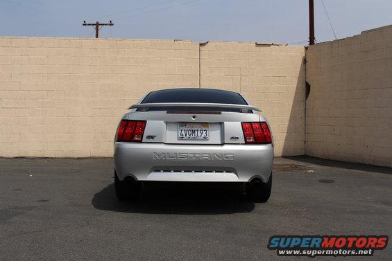 Silver 2002 Ford Mustang GT rear view, license plate 4VOM193