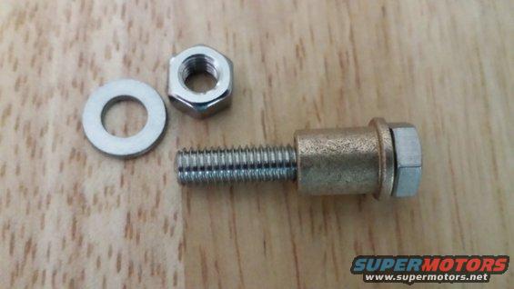 Bolt with a brass spacer, a washer, and a nut, plus a separate washer and nut