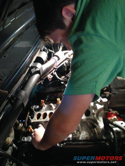 Running the bolts for the intake.