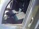 2004 Jeep Grand Cherokee - View of the front seats and center console from the driver's side door.