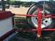 1979 Ford Bronco - Bent a CB Antenna mirror mount and attached to the spare tire holder.
