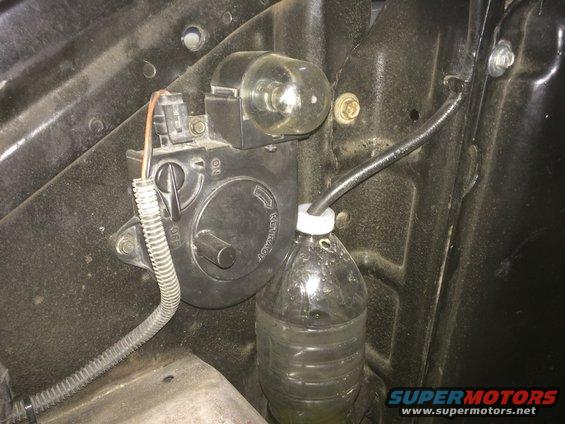 Scored a great engine bay light off of an old Chevy at a junkyard, The cord extends out to 20 foot and then reels back in.