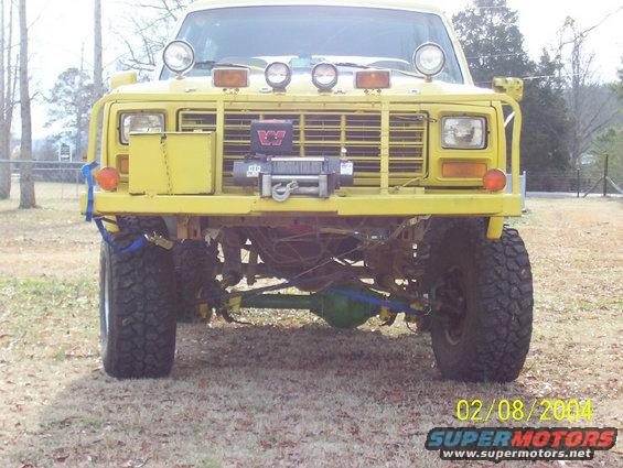 Yellow 1981 Ford Bronco front view with winch and off-road lights
