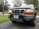 2000 Ford Ranger - Front view of a gold 2000 Ford Ranger pickup truck equipped with a bull bar and aftermarket skid plate.