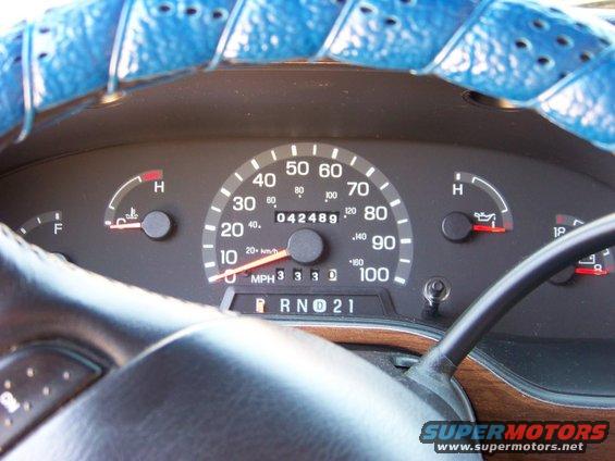 Dashboard with speedometer, odometer showing 042489, and gear selector