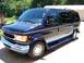 2000 Ford E150 - This 2000 Ford E150 van is shown from the front three-quarter view.