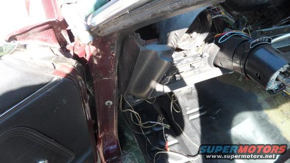 1972 Ford Ranchero interior, maroon exterior, showing disassembled dashboard and steering column with exposed wires