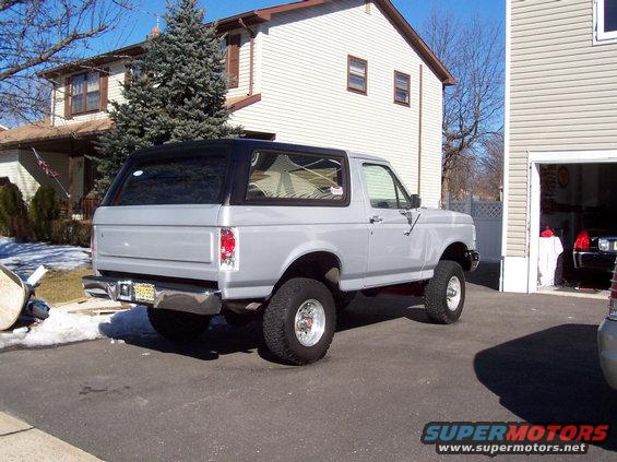 1990 Ford Bronco parked in driveway, rear view