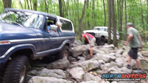 Blue SUV with chrome trim on rocky trail, 1978