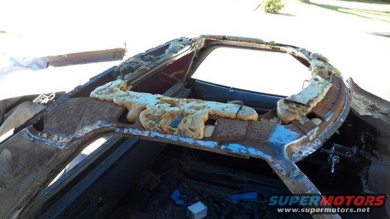 Rusted car roof structure with expanding foam insulation