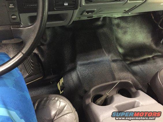 1994 Ford Bronco interior showing floor, dashboard, and steering wheel
