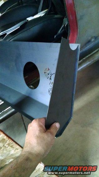 Metal panel with piston graphic and cutouts