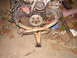 1964 Volkswagen Beetle - Volkswagen engine with exhaust headers and fan belt visible.