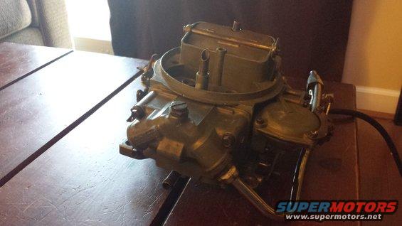 Carburetor on wooden table