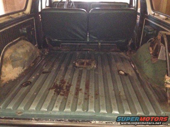 1979 Ford Bronco interior cargo area showing ribbed floor and rear seats