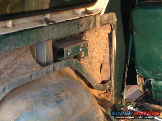 Interior door panel and green seat of a 1979 Ford Bronco