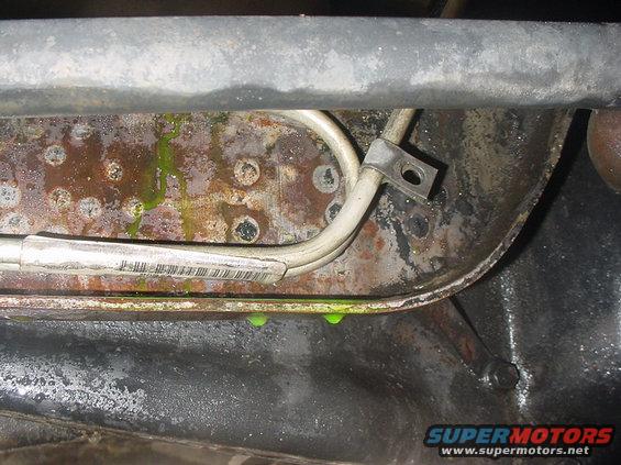 Leaking coolant from a metal component with a barcode