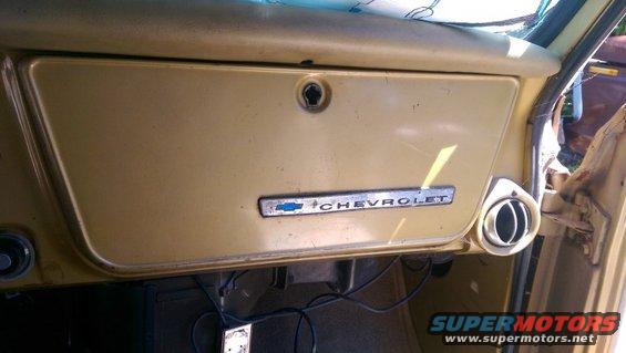 1968 Chevrolet C/K Pickup interior dashboard with Chevrolet emblem on glove box door and air vent