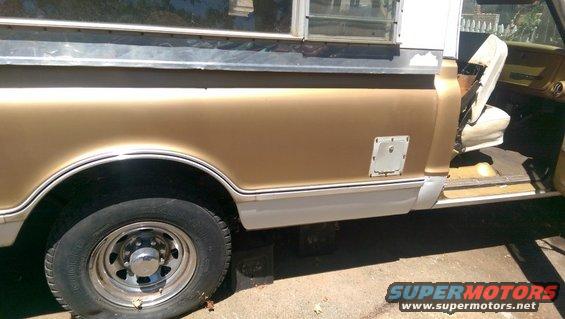 1968 Chevrolet C/K Pickup truck side view showing the rear wheel well, door, and part of the bed