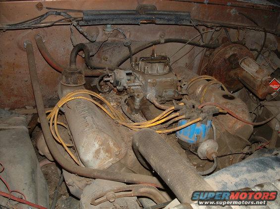 1988 Ford F-150 engine bay with a V8 engine, carburetor, and distributor cap