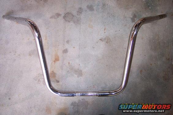 Chrome handlebars on concrete floor