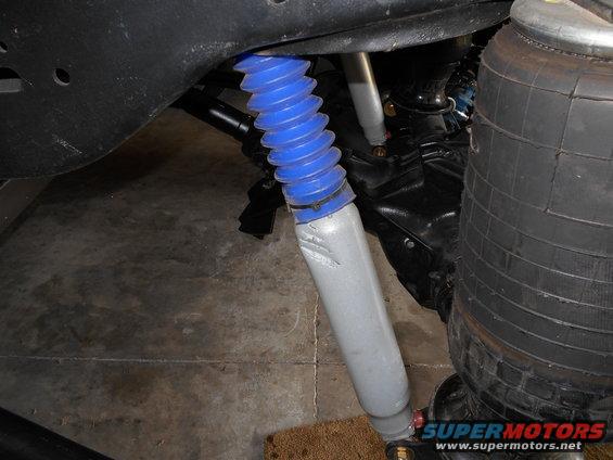 Shock absorber with blue boot and air spring