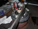 1992 Ford Bronco - A differential carrier is shown with a torque wrench and two cans of spray lubricant.
