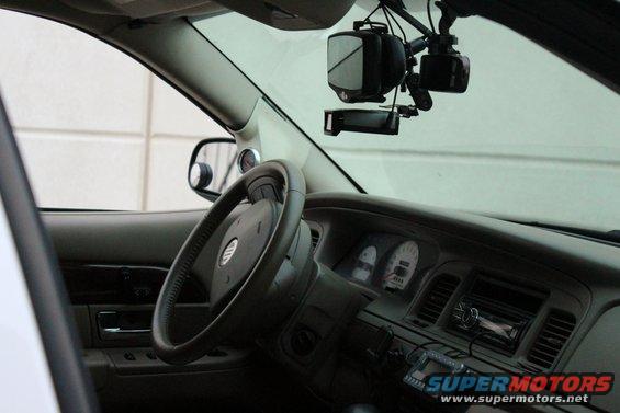 Interior view of a 2000 Mercury Grand Marquis with dashboard and steering wheel