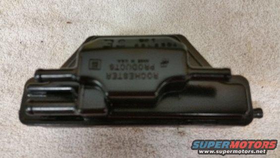 Black Rochester Products valve cover with text embossed on top