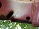 1970 Ford F-250 - This close-up shows a section of rusted metal with two holes, possibly from a vehicle's body.