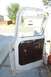 1970 Ford F-250 - Interior view of a 1970 Ford F-250 door panel, showing the crank window mechanism.