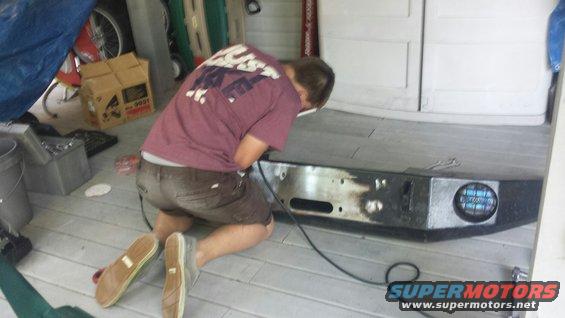 My son getting to work stripping off the old paint and rust