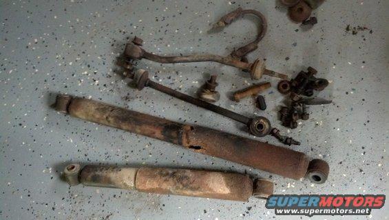 Junk...
Notice the muffler clamp; the whole "clamp" portion was rusted away.
