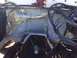 1978 Ford Bronco - Engine bay components covered for repair work, showing wiring and structural elements.