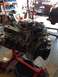1978 Ford Bronco - Engine on a stand in a garage, likely for an engine swap. The registry claims it's a 1978 Ford Bronco engine, but this cannot be confirmed…
