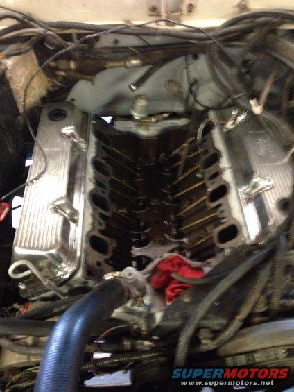 Engine with chrome valve covers and intake manifold removed