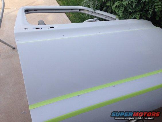Passenger Side door in primer, final stages of body work almost ready to paint February. 14 2015