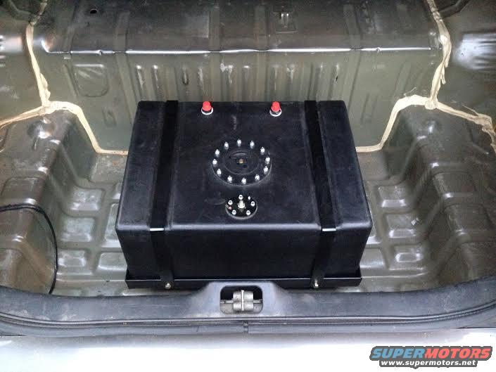 Trunk interior with a large black fuel cell installed