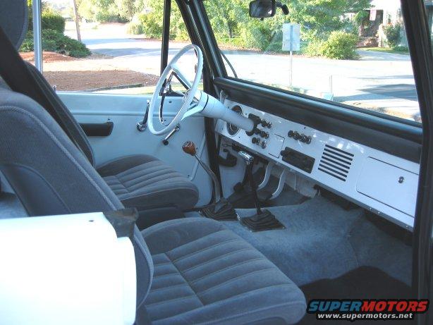 Interior view of a 1967 Ford Bronco showing dashboard and seats