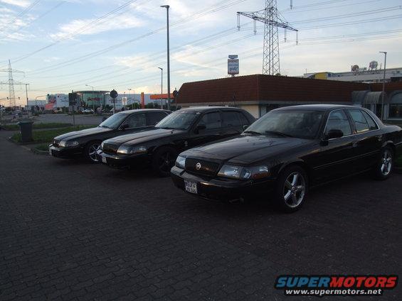 Three black 2003 Mercury Marauders parked side-by-side