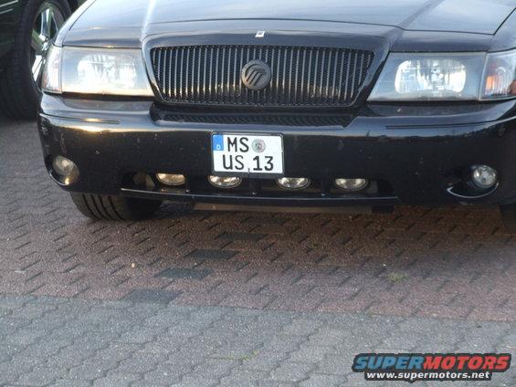 Black 2003 Mercury Marauder front end with vertical grille and fog lights
