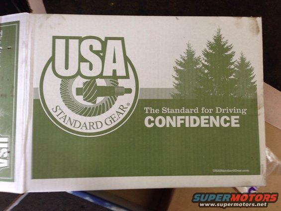 Box for USA Standard Gear, shows a gear graphic and trees. Says 'The Standard for Driving CONFIDENCE'