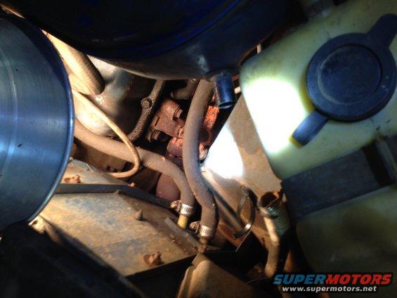 charcoal-can-6.jpg Picture of Breather with Tit to connect the cardboard lined hose (pictured bottom left) which IS connected to the Charcoal Canister). DOES THIS NEED TO BE CONNECTED TO BREATHER?