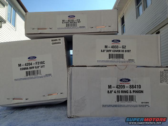 Boxes of Ford Racing differential parts: M-4204-F318C Cobra Diff, M-4033-G2 Diff Cover 05, M-4210-C3 Diff Install Kit, M-4209-88410 Ring & Pinion