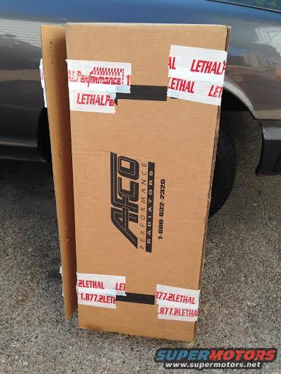 Cardboard box for AFCO Performance Radiators, taped with Lethal Performance branding