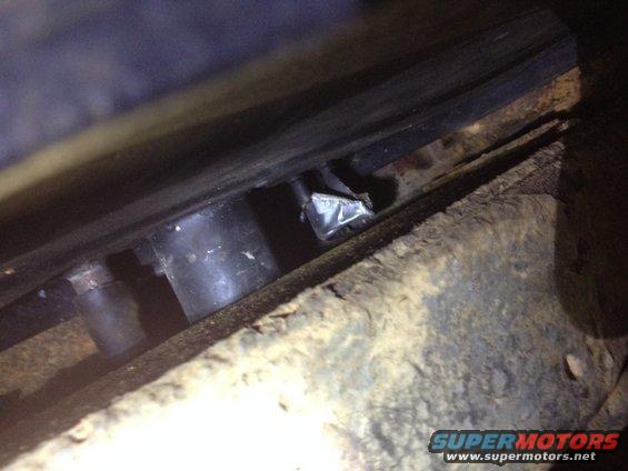 gas-tank-tits-covered-in-duct-tape.jpg Picture of Driver's Side of Gas Tank with Two Tits not connected to any hoses (in center of picture covered in Silver duct tape). How important is it that these are connected?