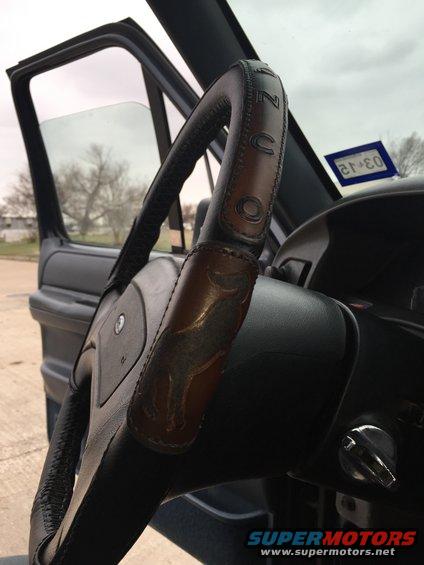 Steering wheel with embossed horse and "Bronco" lettering