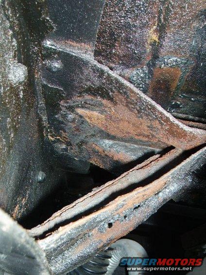 Rusted frame components with visible Supermotors.net watermark