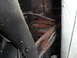1978 Ford Bronco - Close-up view of heavily rusted frame components, likely from the undercarriage of a vehicle.